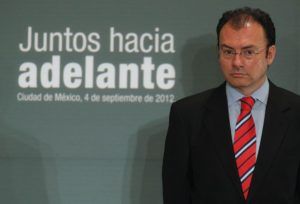 Luis Videgaray, a member of the transition team for Mexico's President-elect Enrique Pena Nieto, attends a news conference in Mexico City, in this September 4, 2012 file photo. Videgaray, Pena Nieto's right-hand man and leader of his transition team, is well regarded by investors and tipped to be finance minister or take a top position overseeing government policy. The writing on the wall reads "Forward together."  To match Newsmaker MEXICO-PENANIETO/VIDEGARAY   REUTERS/Tomas Bravo/Files (MEXICO - Tags: POLITICS) ORG XMIT: CDG03